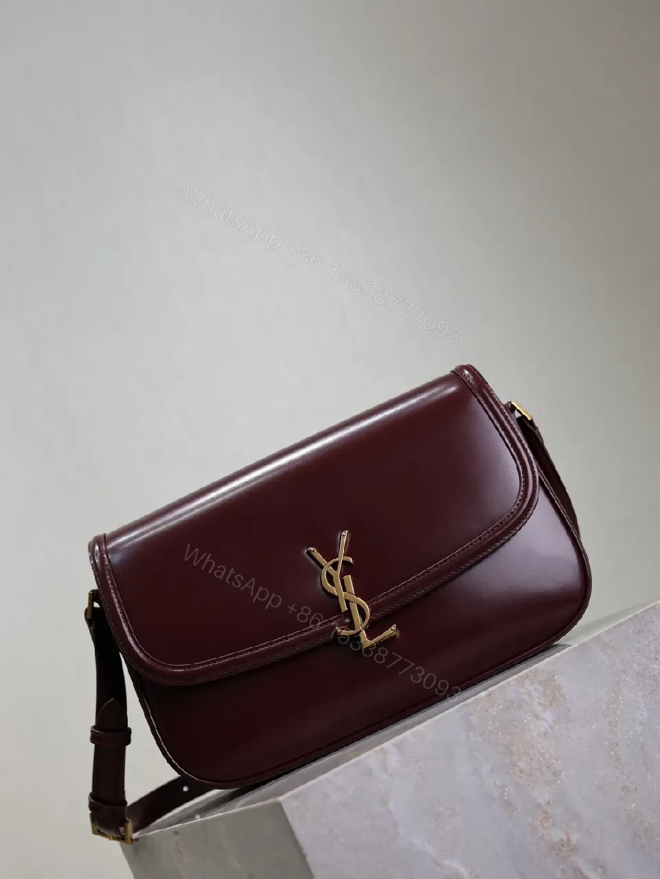 View 3 of Structured Burgundy Leather Crossbody: Gold Logo, Modern Chic