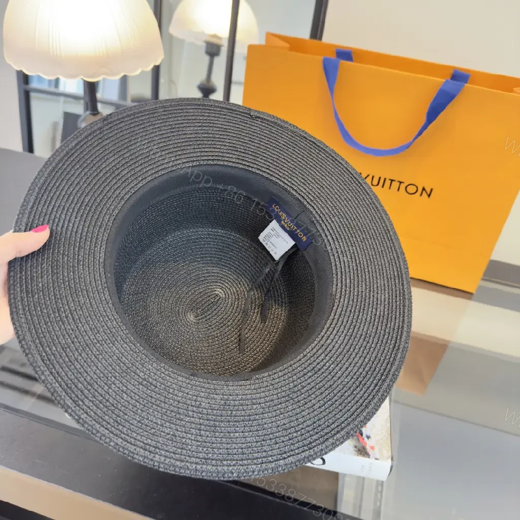View 5 of Black Woven Hat with Blue Band and LV Charm | Wide Brim