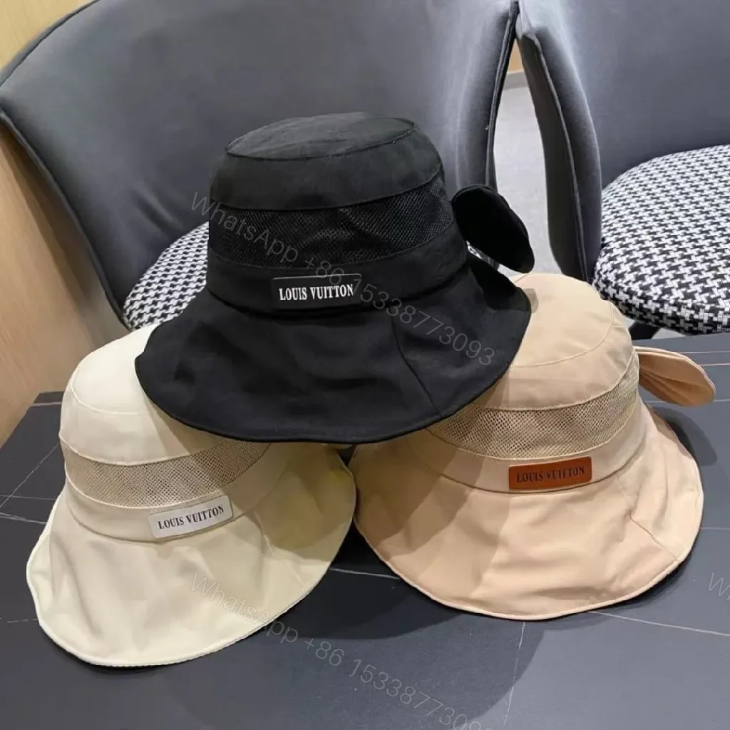 View 5 of Minimalist Black Bucket Hat with Discreet Luxe Label