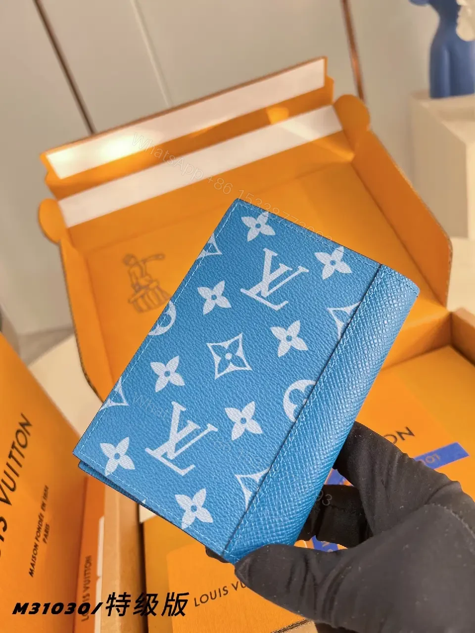 View 3 of Blue Monogram Leather Wallet: Compact Luxury, Secure Card Slots