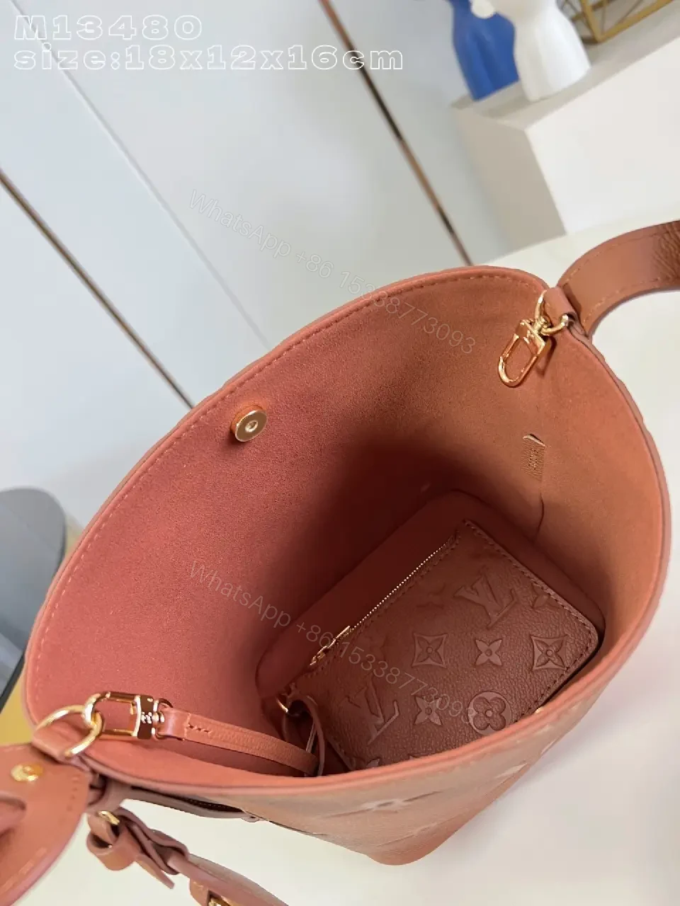 View 2 of Soft-Tone Cropped Bucket Bag with Monogram Embossing Bag