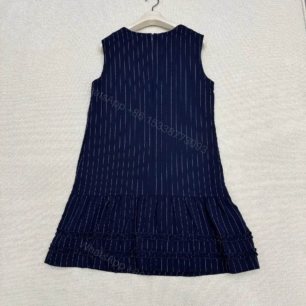 View 4 of Navy Pinstripe Cotton A-Line Dress with Chanel Logo Key Feature