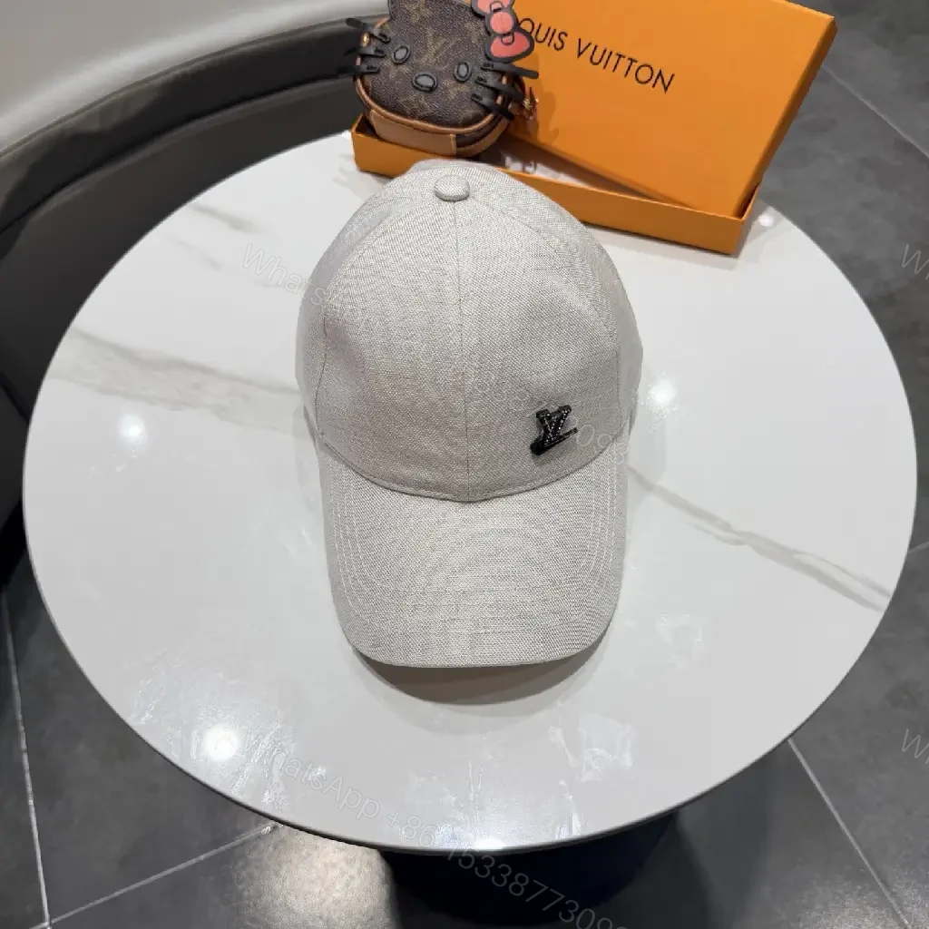 View 9 of Cozy Chic Cap: Subtle LV Logo, All-Season Cotton blend Cap