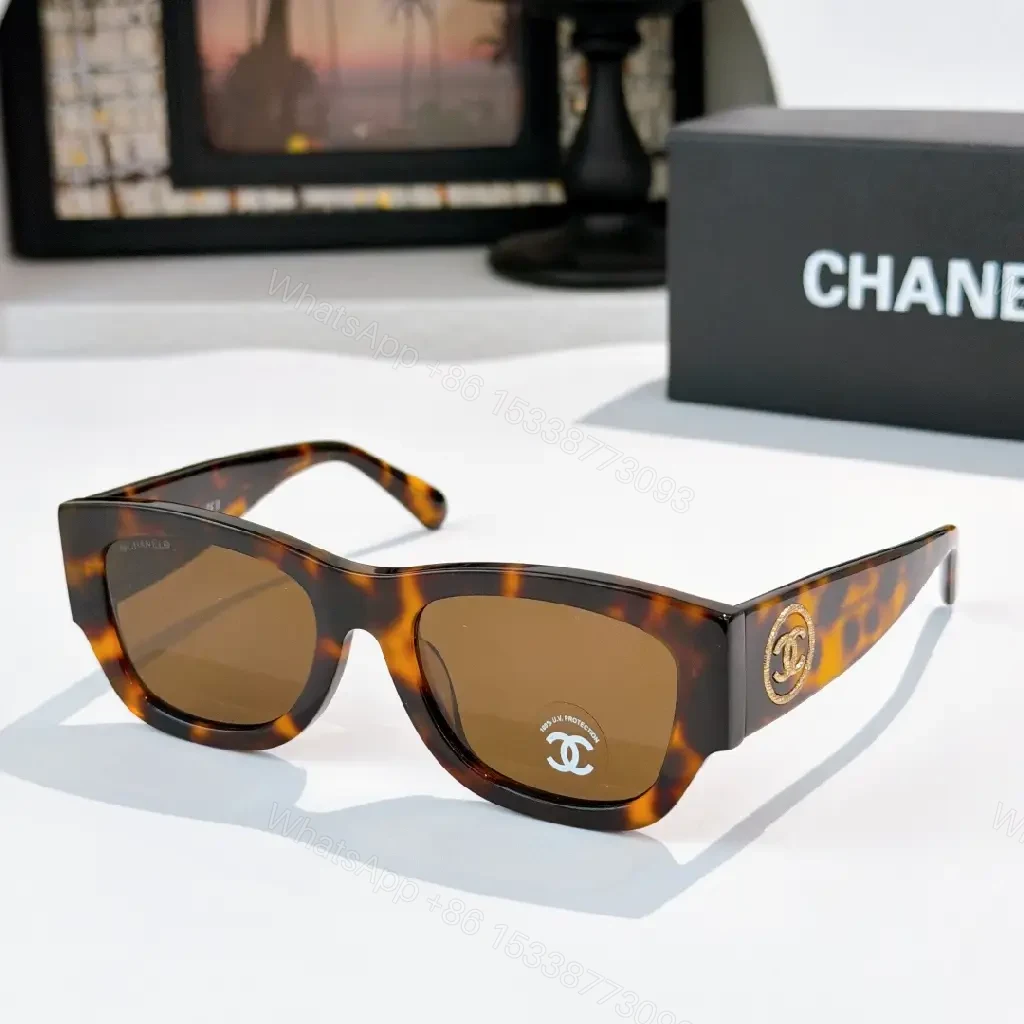 Tortoise-Texture Sunglasses with Logo Hardware, Acetate Style — view 1