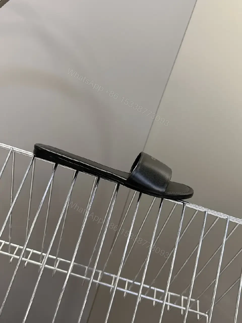View 5 of Minimal Black Leather Slide – Luxury Minimalist Comfort
