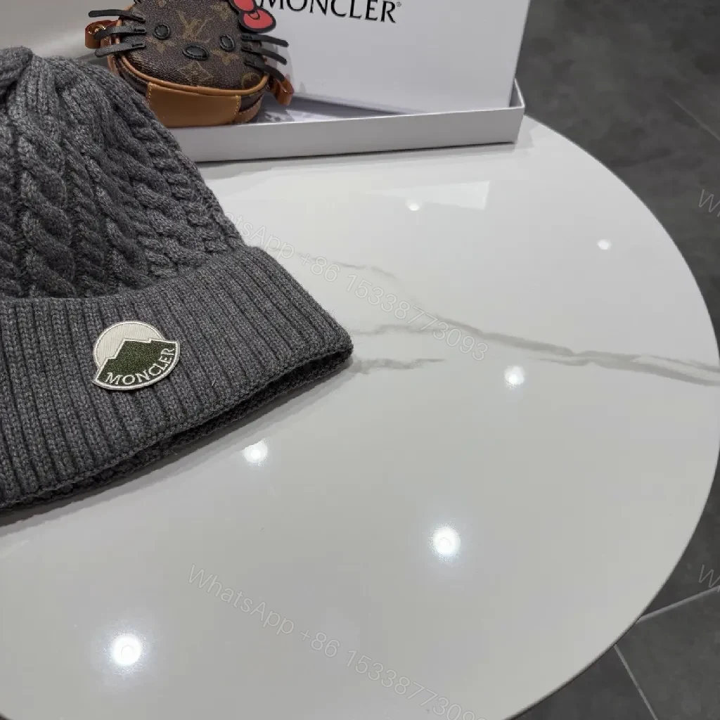 View 9 of Cozy Cable Knit Beanie: Subtle Moncler Sealing Luxury Winter Beanie