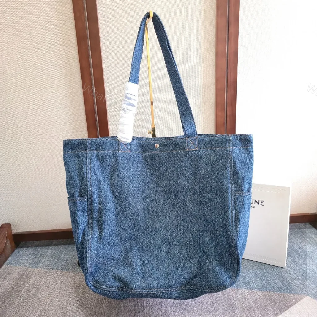View 2 of Denim Tote with Embossed Logo—Structured Luxury Tote
