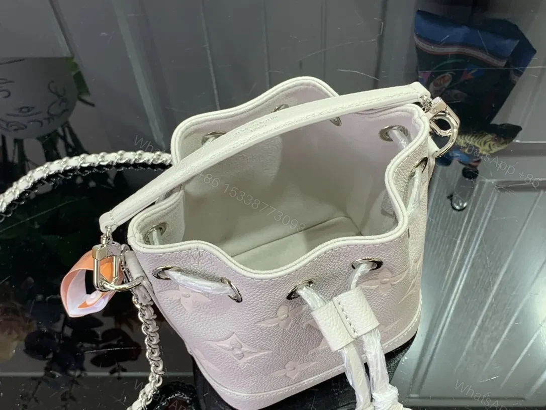 View 4 of Soft-Shadow Monogram Bucket Bag: Modern Texture, Subtle Luxury