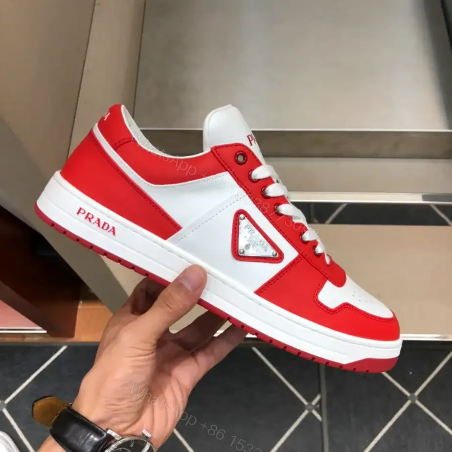 View 2 of PRADA DOWNTOWN LEATHER SNEAKERS IN WHITE AND LACQUER RED- PRD012