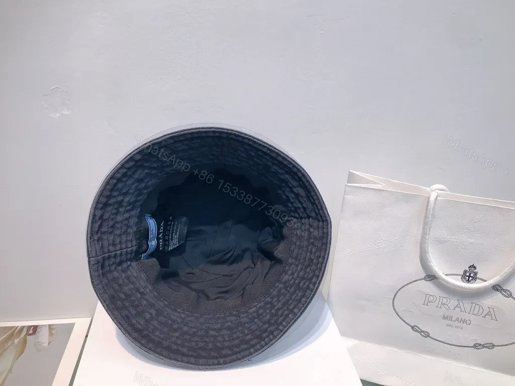 View 3 of Chic Buckle-Textured Pink Palette Bucket Hat - Prada Logo
