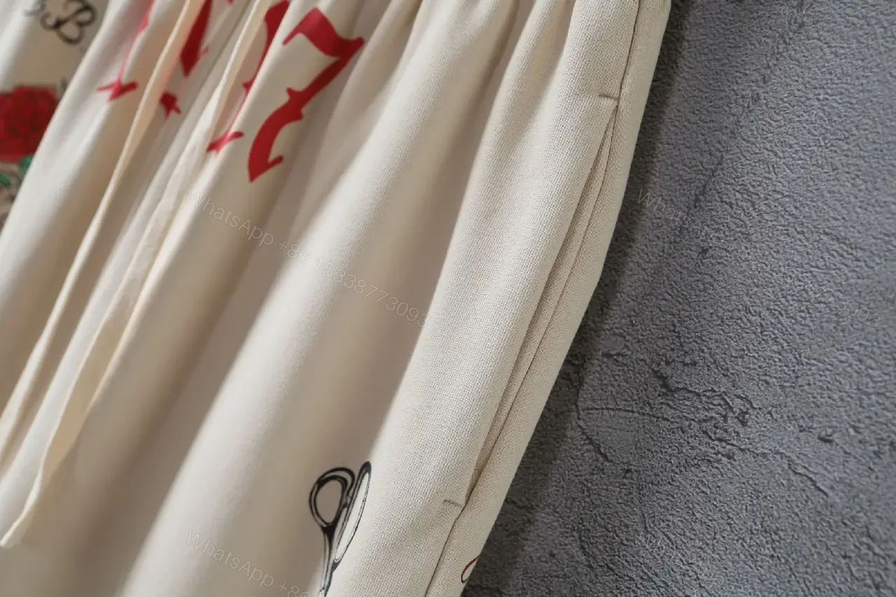 View 9 of Beige Wide-Leg Pants with Drawstring and Embroidered Patches