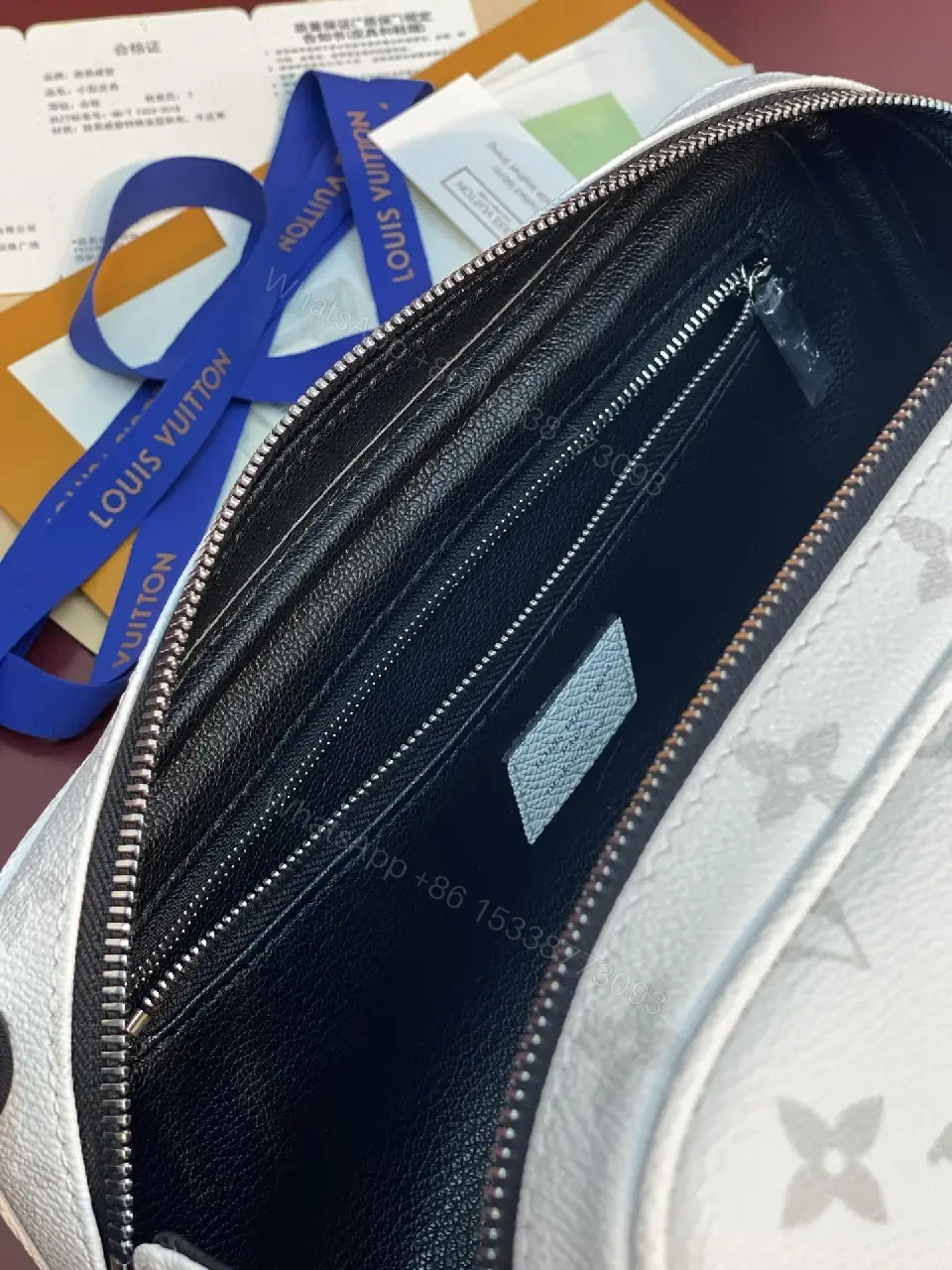 View 10 of White Leather Monogrammed Subtle LV-inspired Cosmetic Bag