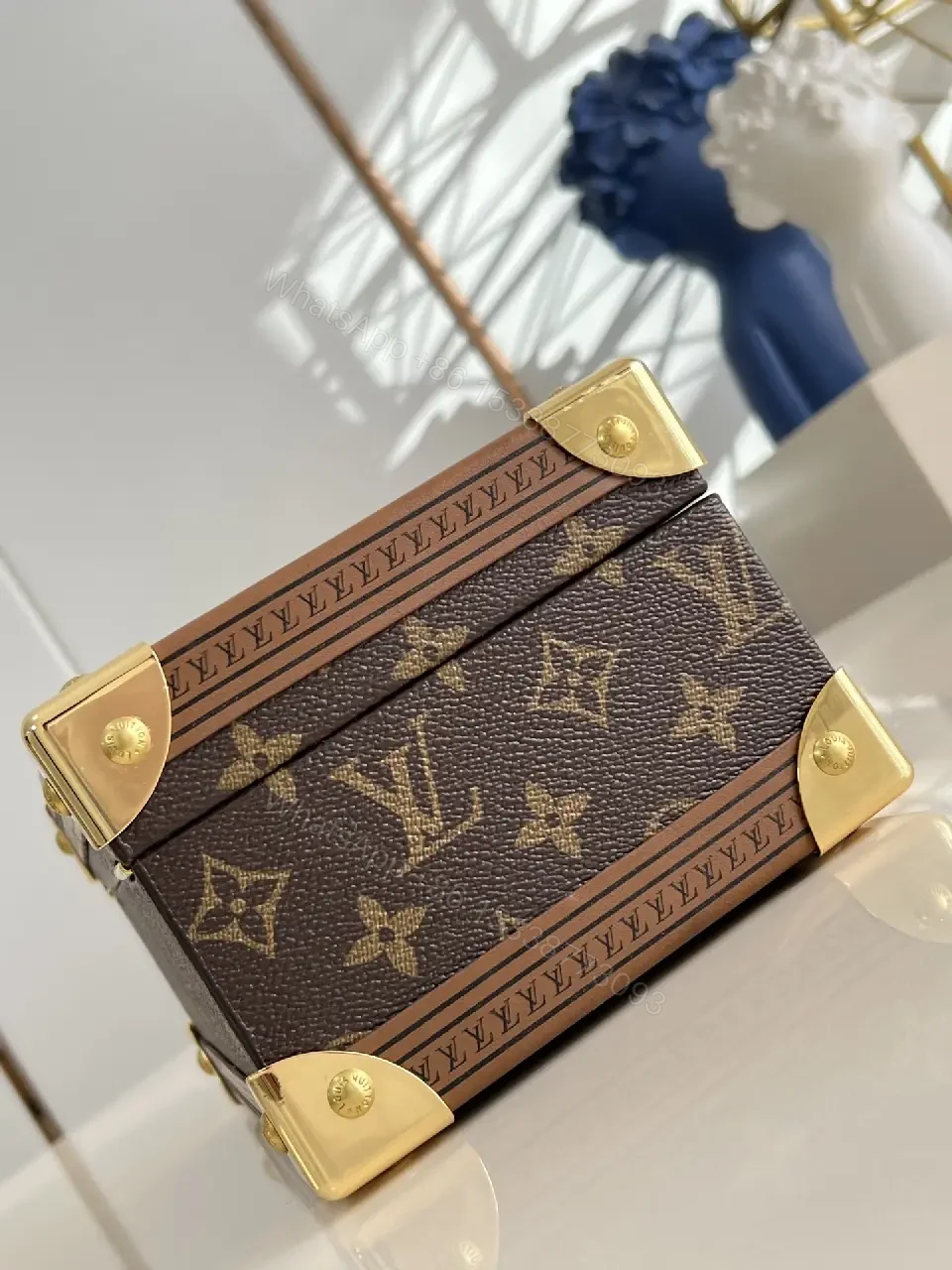 View 3 of Monogram Canvas Clutch with Gold Hardware - Structured Luxe Style