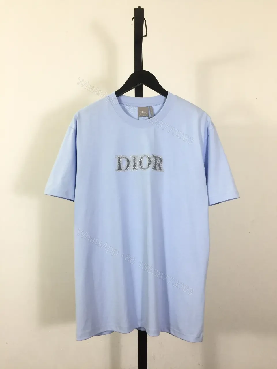 View 6 of Light Blue Oversized Tee with Sparkling DIOR Logo Embroidery, Short-Sleeve, Relaxed Fit