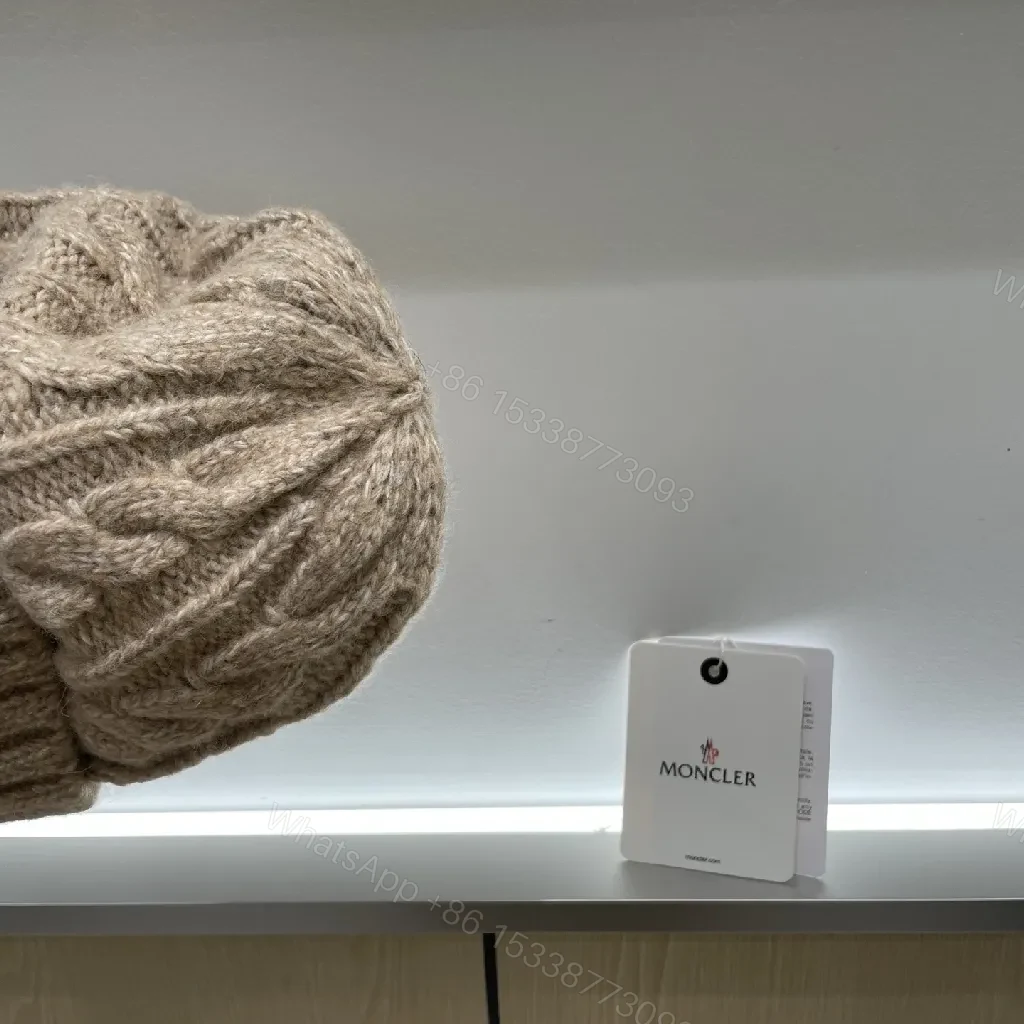 View 2 of Beige Cable Knit Beanie with Signature Patch Essential Warmth