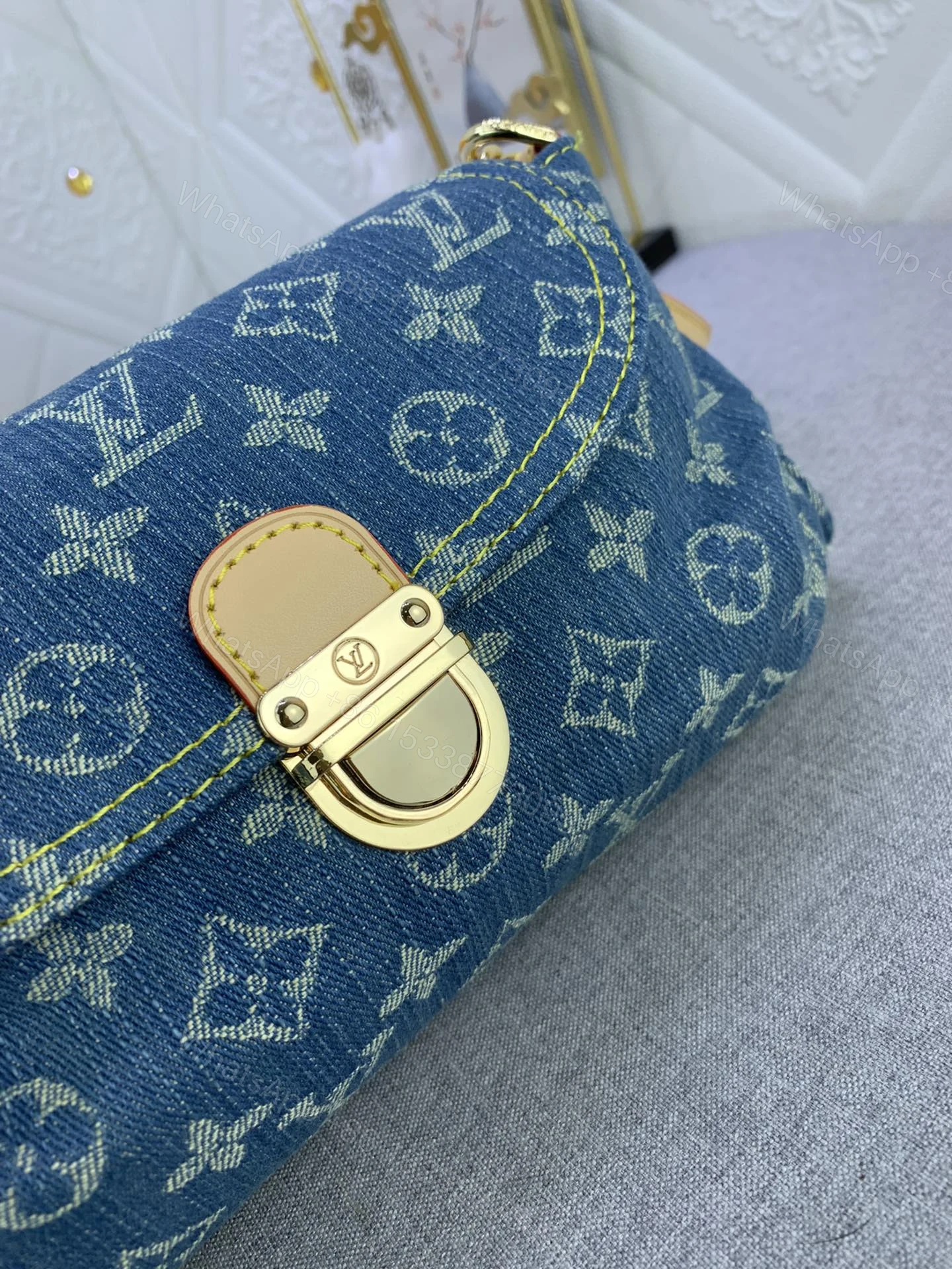 View 6 of Louis Vuitton Pleaty bag in blue denim
