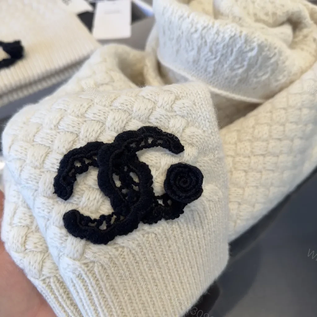 View 3 of Ivory Knit Set: Textured Luxury with Iconic Emblem
