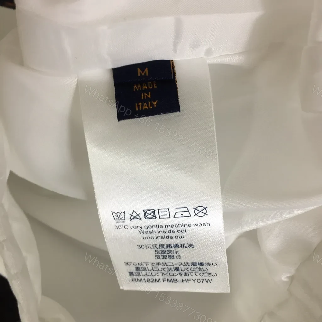 View 8 of White Zip-Front Jacket with Subtle Monogram Texture