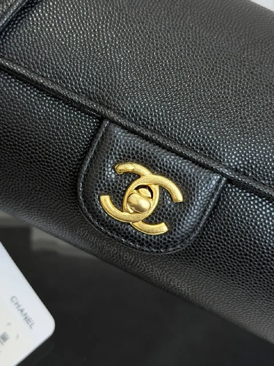 View 4 of Black Grain Leather Crossbody Bag – Gold Twist, Compact & Versatile