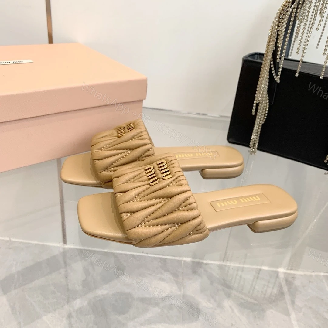 View 2 of MIUMIU MATELASSÉ NAPPA LEATHER SLIDES SAND BEIGE 5XX605 88T F0036 F 010