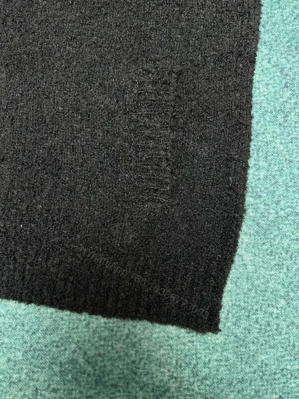 View 8 of Cozy Textured Cardigan: Black Knit with Logo Accent + Everyday Luxury Cardigan