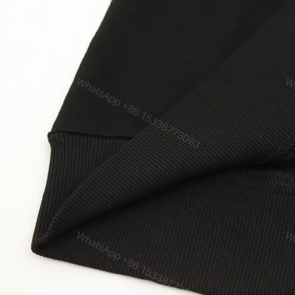 View 8 of Black Knit Crewneck with Signature Check Sleeves, Slim Fit, Luxury Casual