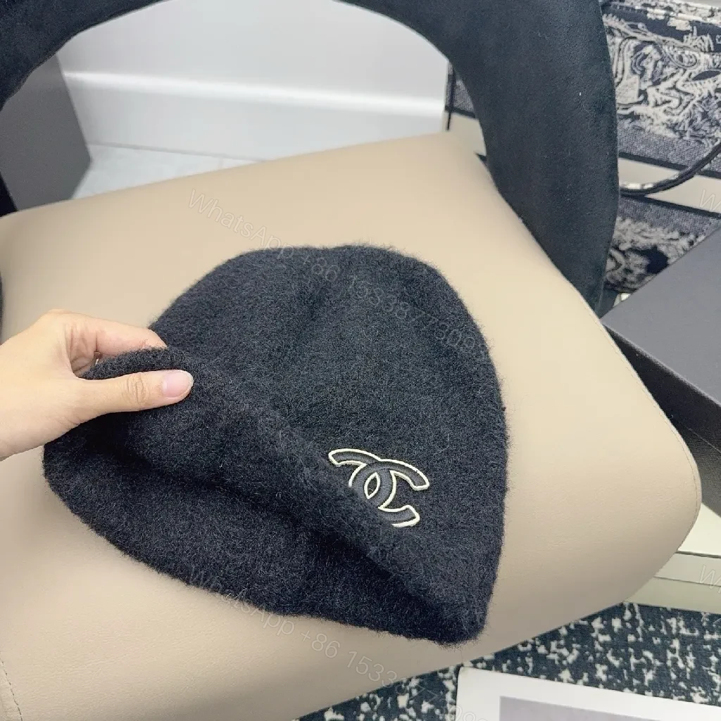 View 8 of Ivory Plush Handwarmer: Luxe Logo-Embossed, Lightweight Warmth