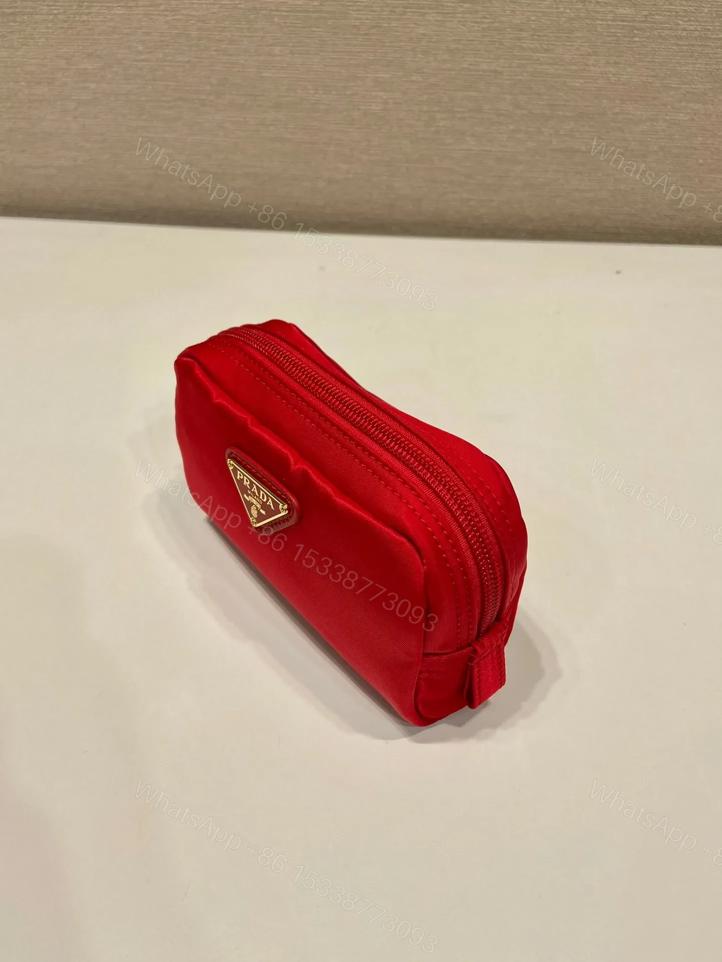 View 2 of CLUTCH 12 IN PASSION RED RE-NYLON