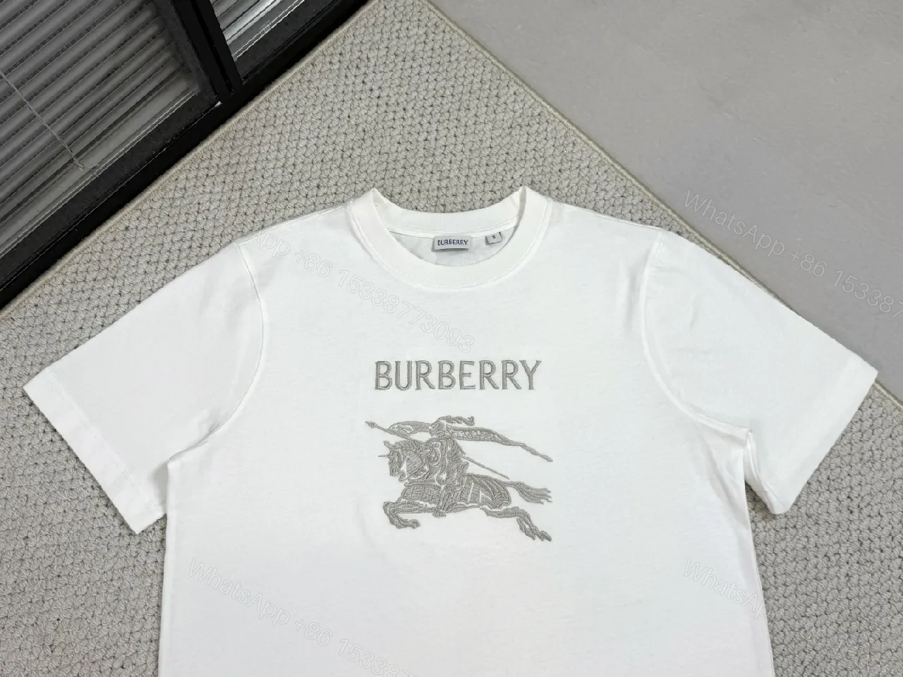 View 5 of White Cotton Tee with Metallic Crest Detailing, Premium Casual Style