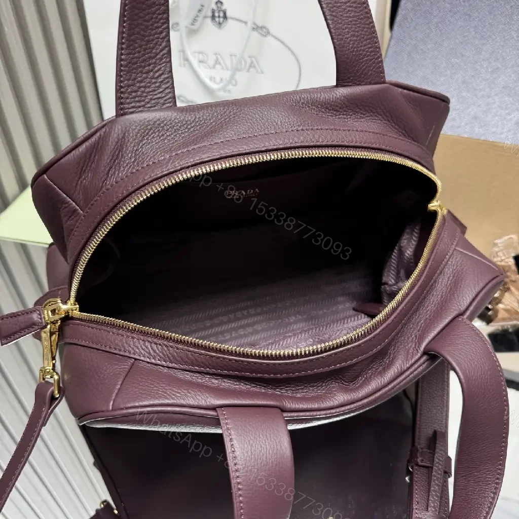 View 3 of Structured Burgundy Pebble-Leather City Bag with Gold Hardware