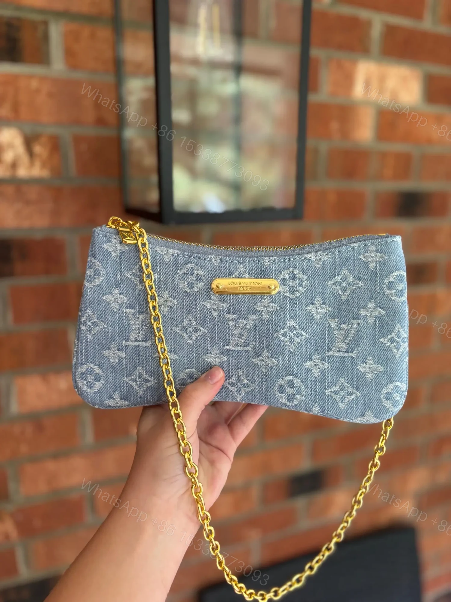 Louis Vuitton Liv Pochette in Blue Denim — view 1