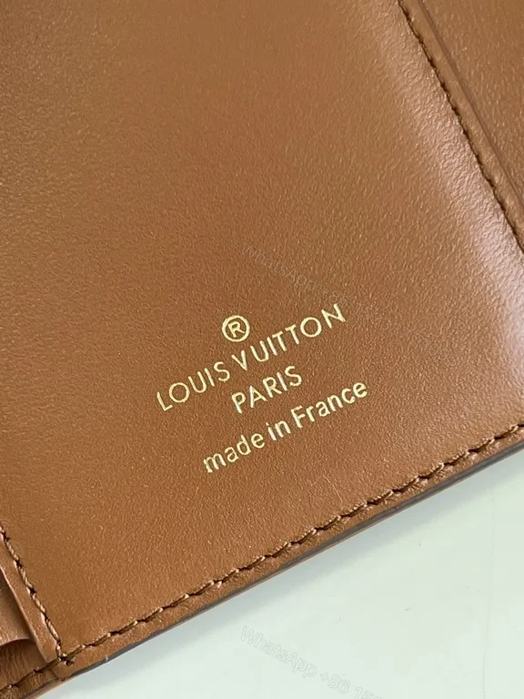 View 3 of Iconic Victorine Wallet: Compact Luxury Canvas & Leather Trim