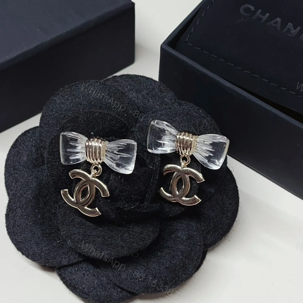 View 5 of CHANEL D25 CC BOW EARRINGS GOLD METAL ABF537 B19997 NAFVG