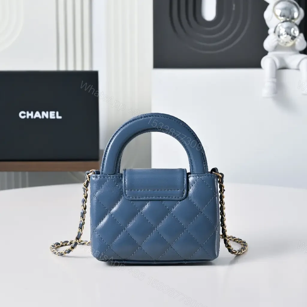 View 8 of Compact Blue Quilted Satchel with Gold Clasp Bag