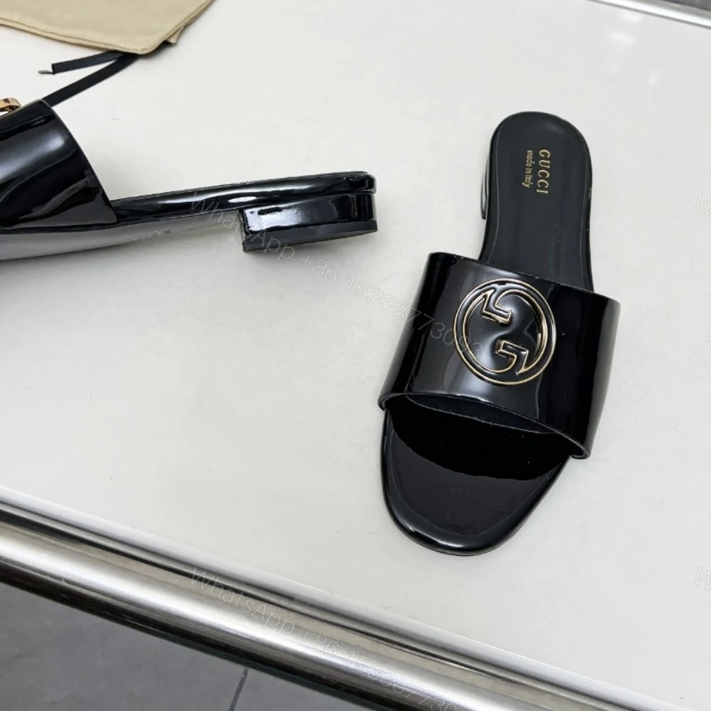 View 4 of GUCCI WOMEN ROUND INTERLOCKING G SANDAL IN BLACK