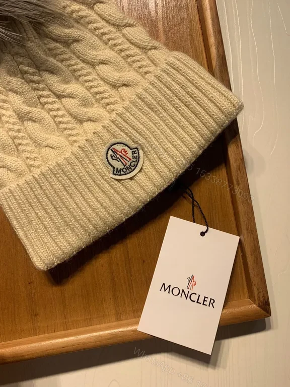 View 5 of Cream Cable-Knit Beanie with Faux-Fur Pom-Pom: Moncler Warmth