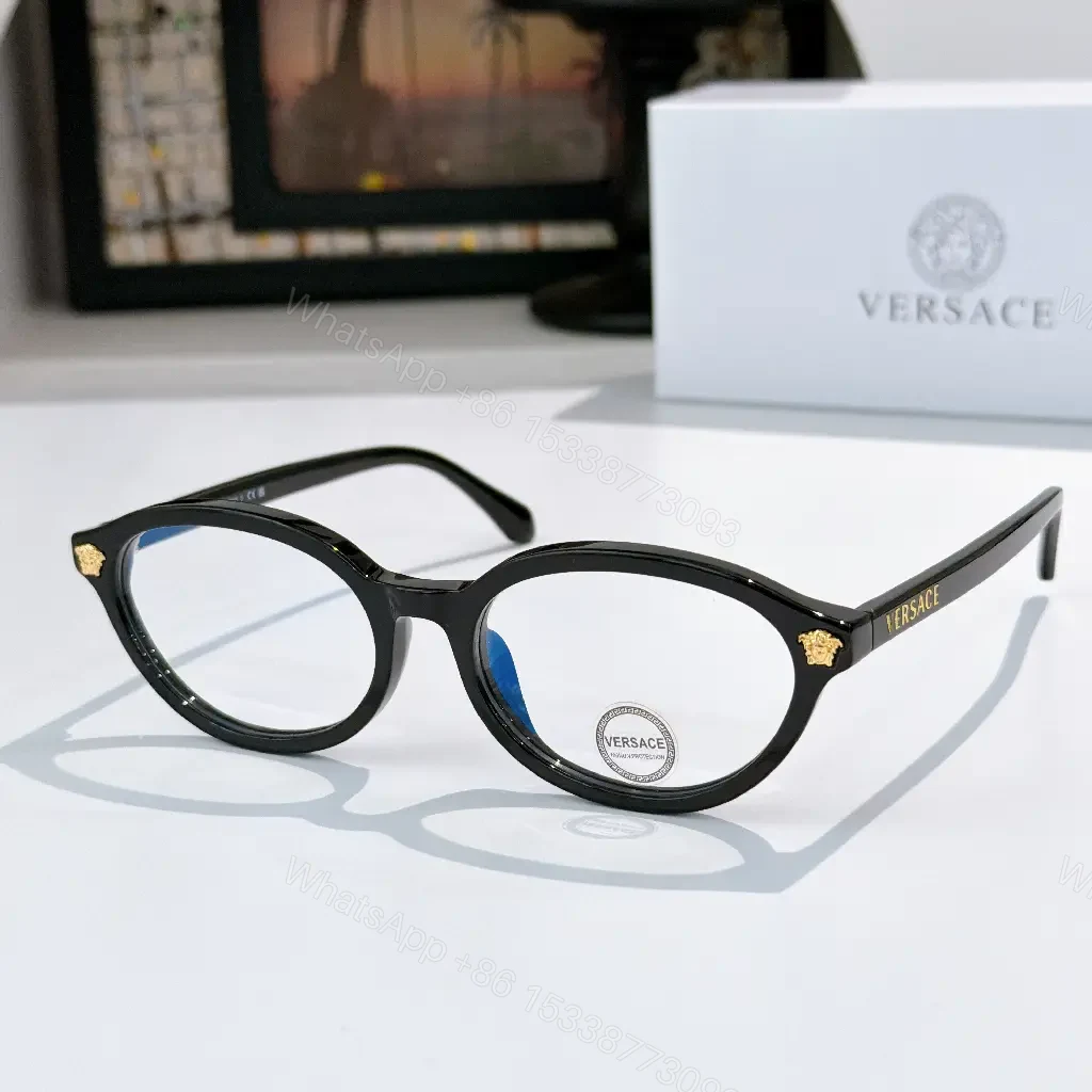 View 2 of Tortoiseshell Round-Frame Sunglasses with Gold Crest Accents