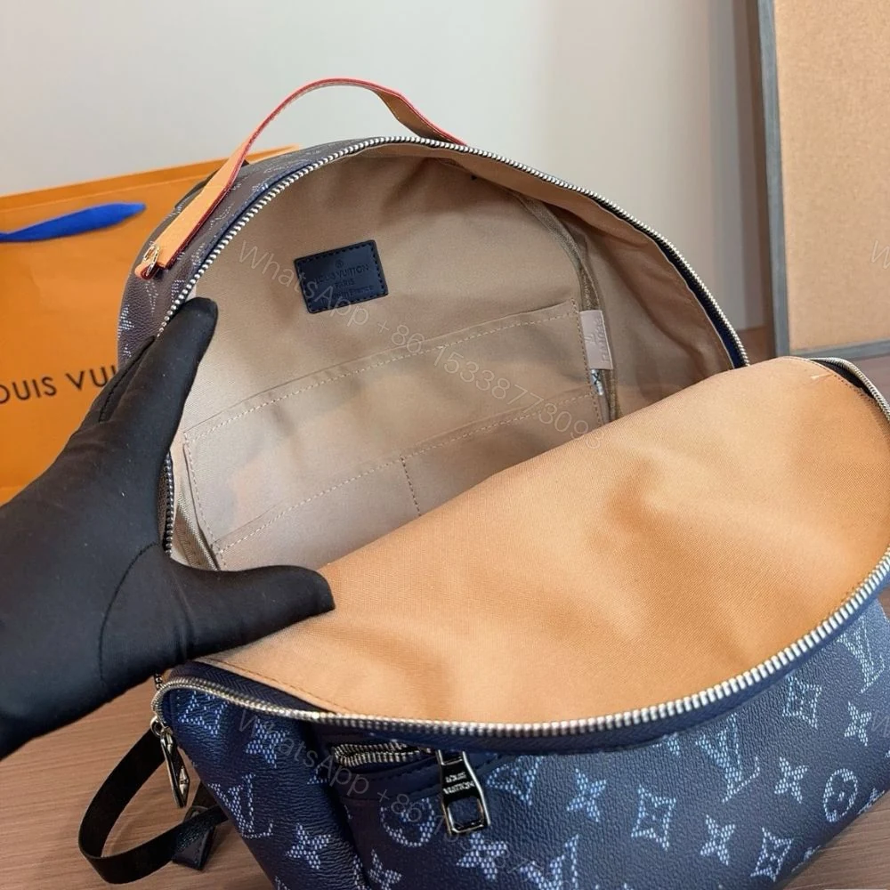 View 4 of Louis Vuitton Discovery Backpack PM Ocean 28Cm M26942