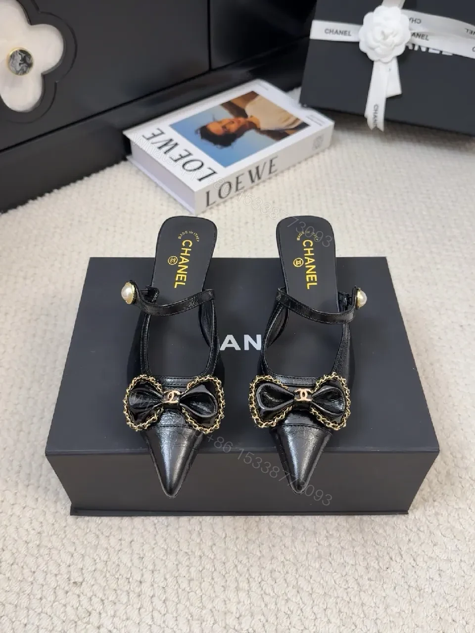 View 4 of Chic Black Patent Mule with Chain Bow Detail, Luxe Style