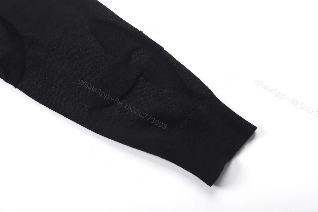 View 10 of Textured Black Knit with Monogram Motif – Luxury Everyday Sweater