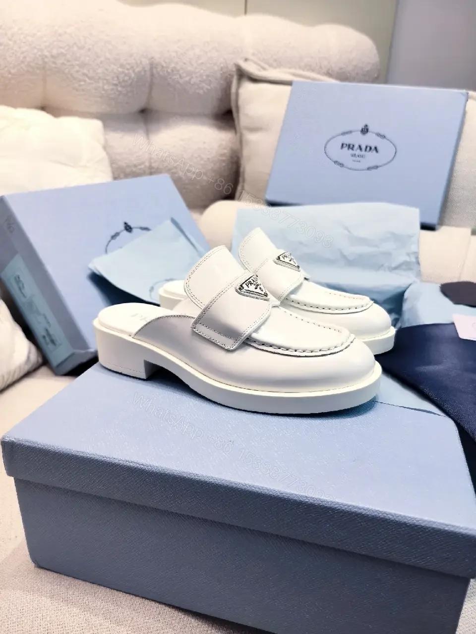 View 10 of White Leather Prada Slip-ons: Classic Padded Comfort Shoes