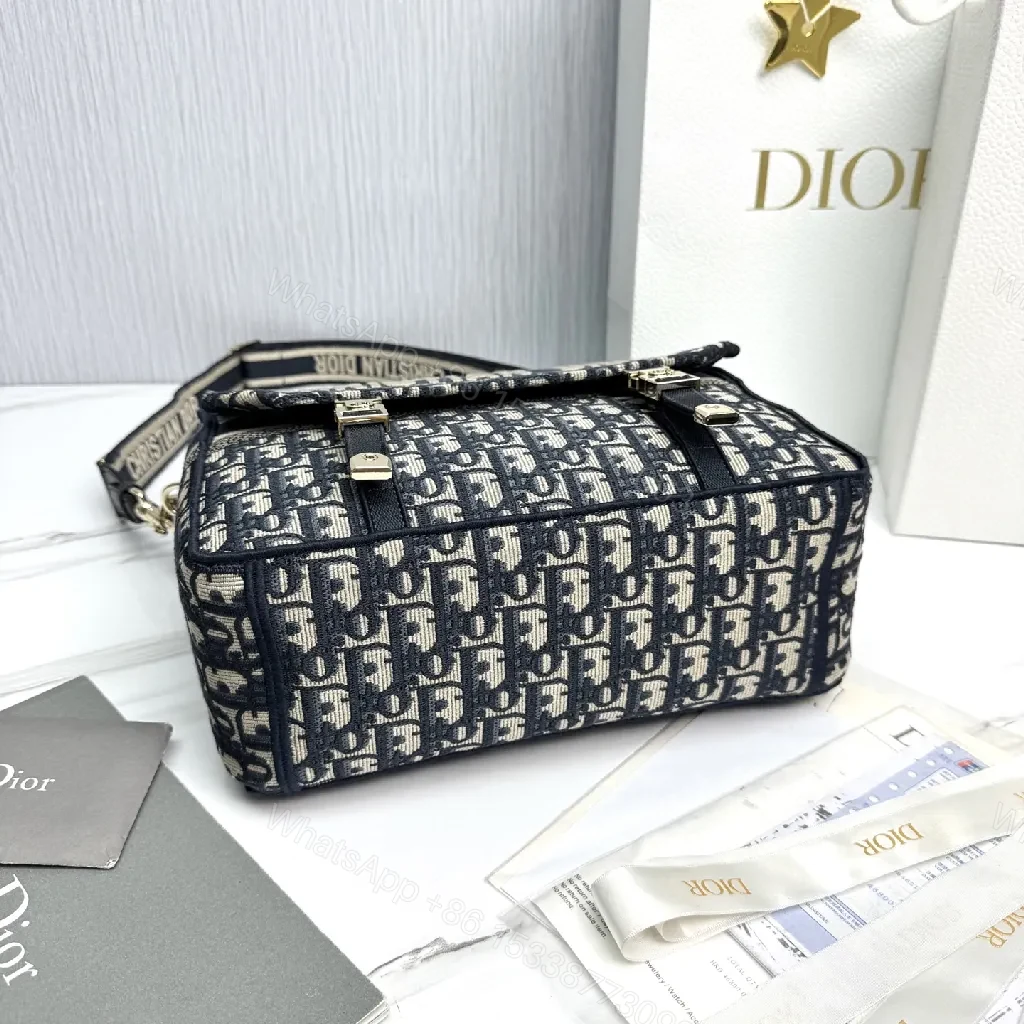View 4 of Compact Monogram Crossbody: Luxe, Structured, Everyday News
