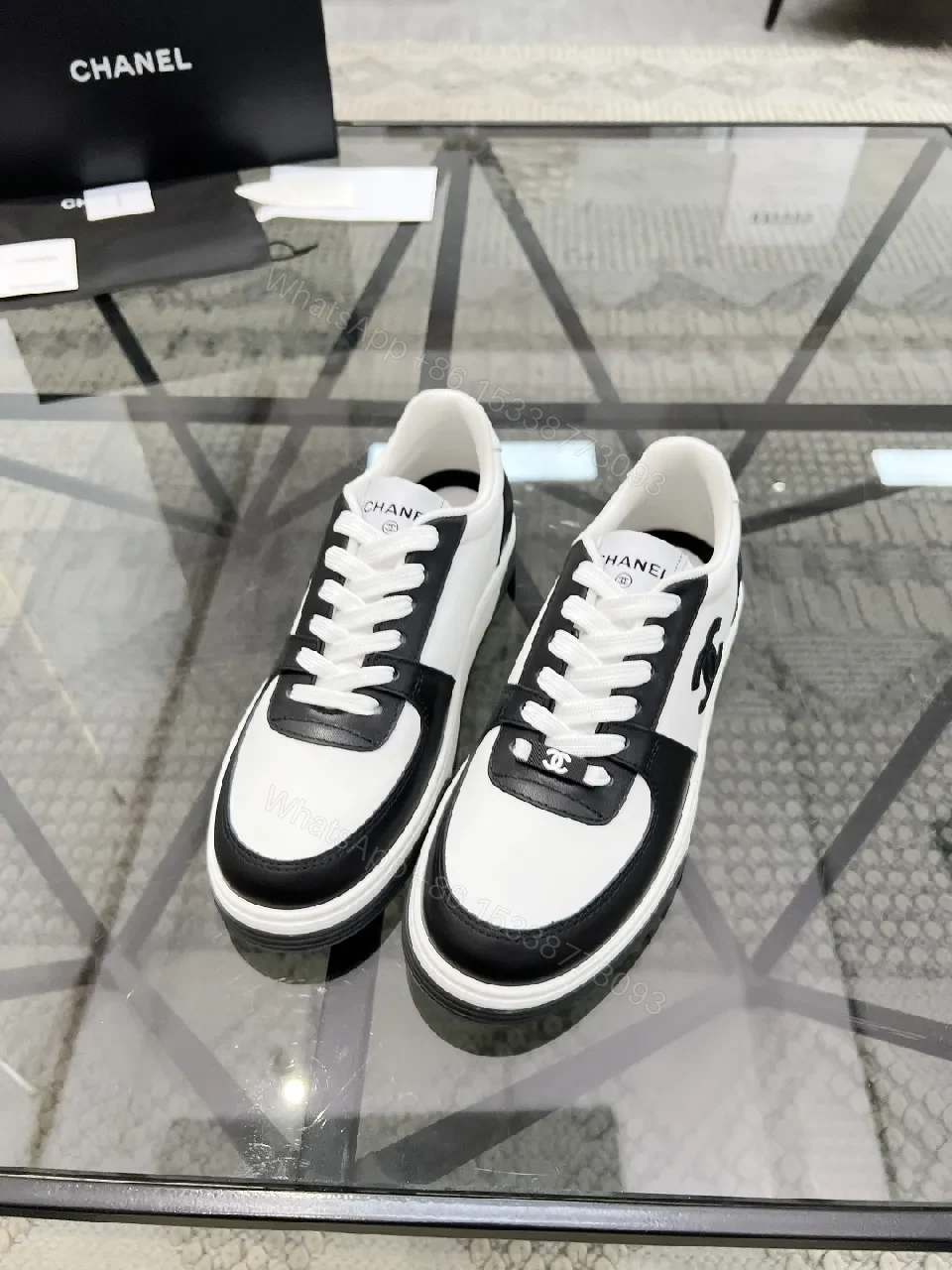 View 3 of Monochrome Leather High-Top Sneaker with Contrast Detailing