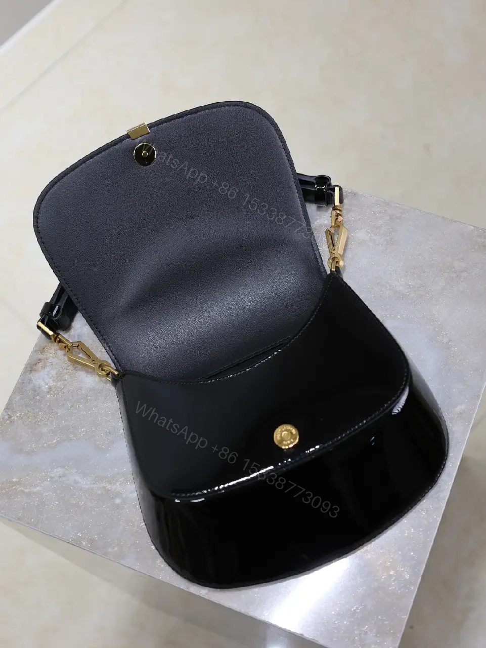 View 5 of Glossy Black Patent Leather Shoulder Bag with Gold Accent