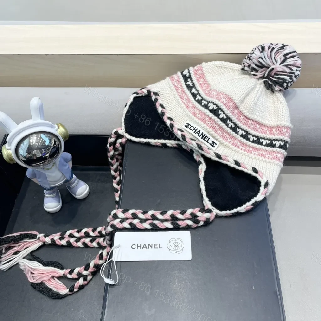 View 7 of Chic Knit Pom Beanie with Braided Tie-Through Straps