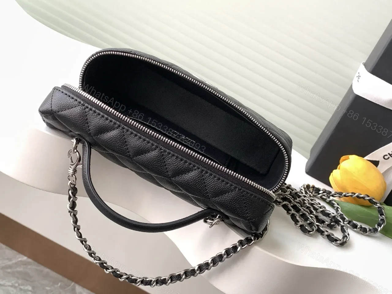 View 6 of Quilted Black Calf Leather Compact Handbag - Chic Versatile Luxury