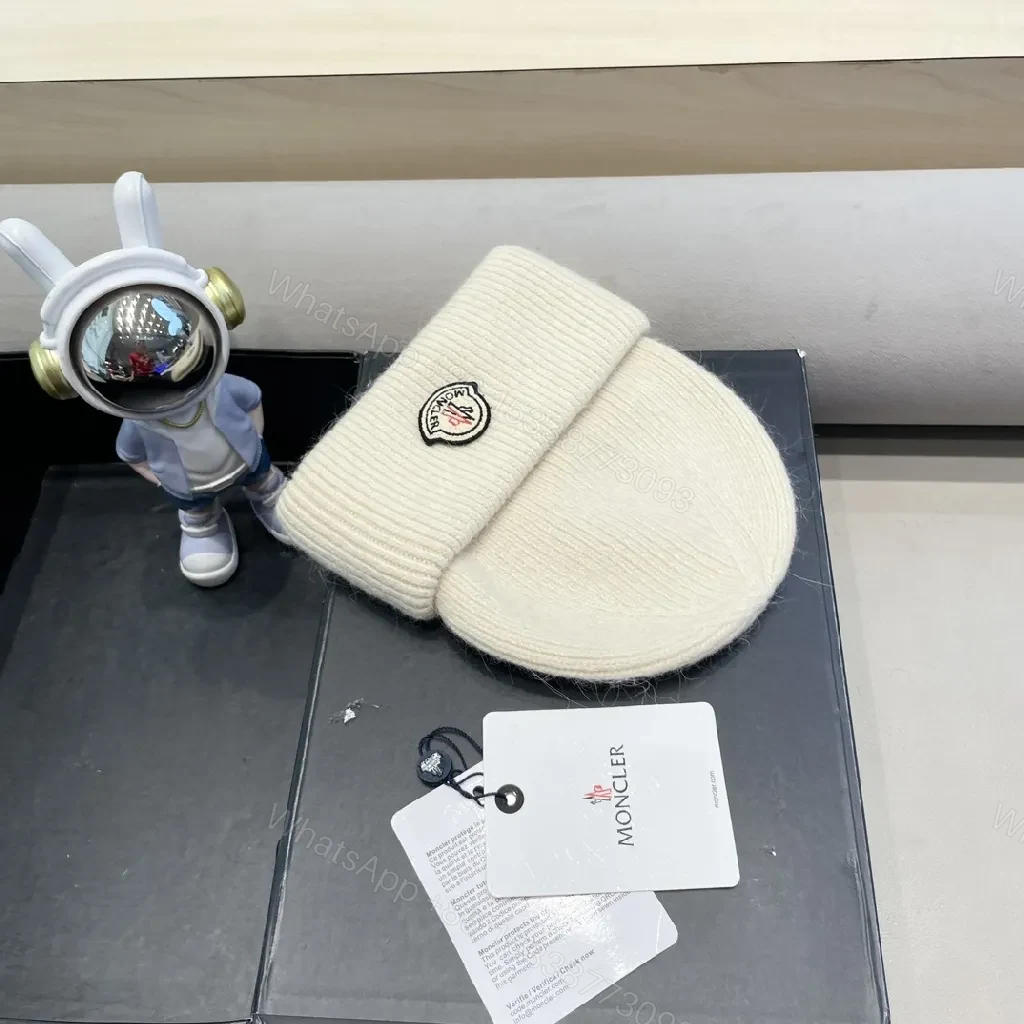 View 3 of Cozy Crest Beanie in Ivory Knit with Subtle Logo Patch
