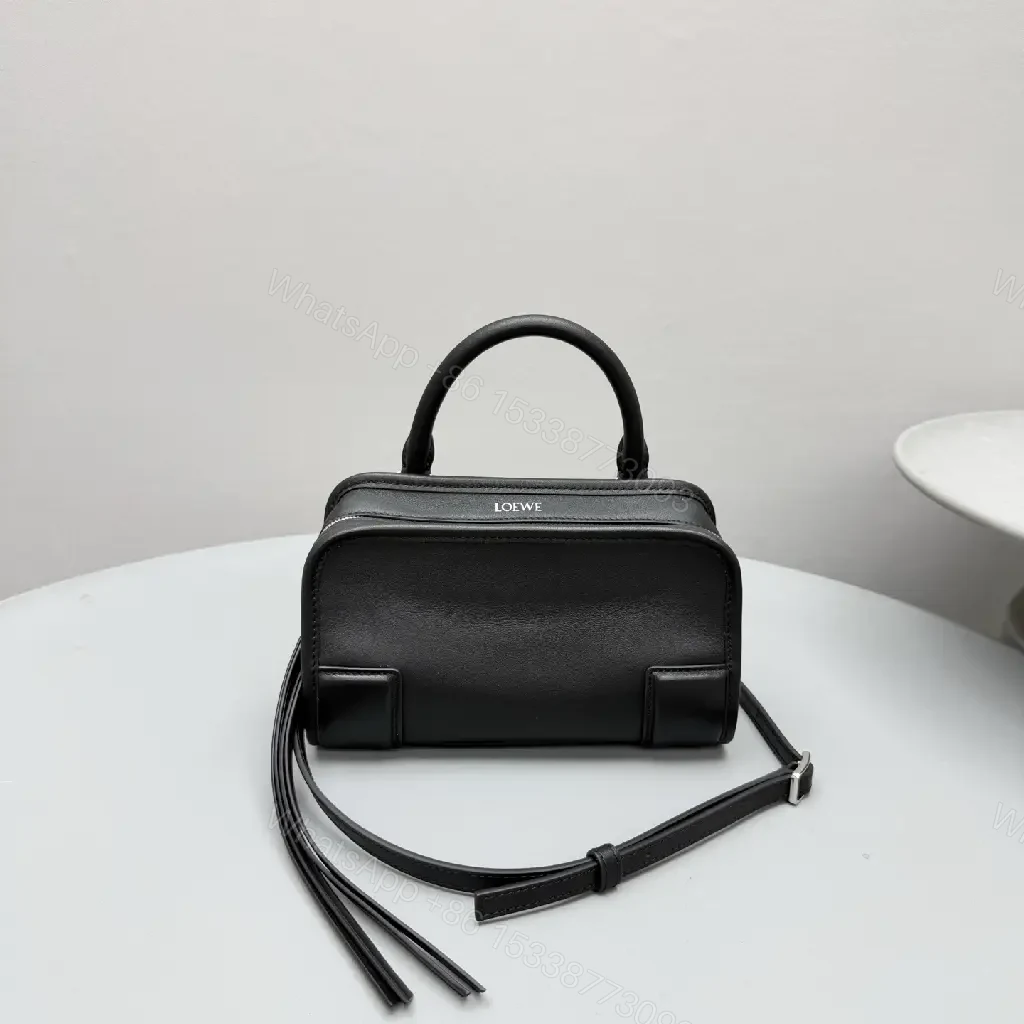 View 2 of Structured Black Leather Mini Bag | Compact, Versatile Carryall