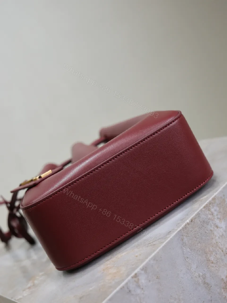 View 7 of Deep Bordeaux Leather Drawstring Bucket Bag—Elevated Everyday Style