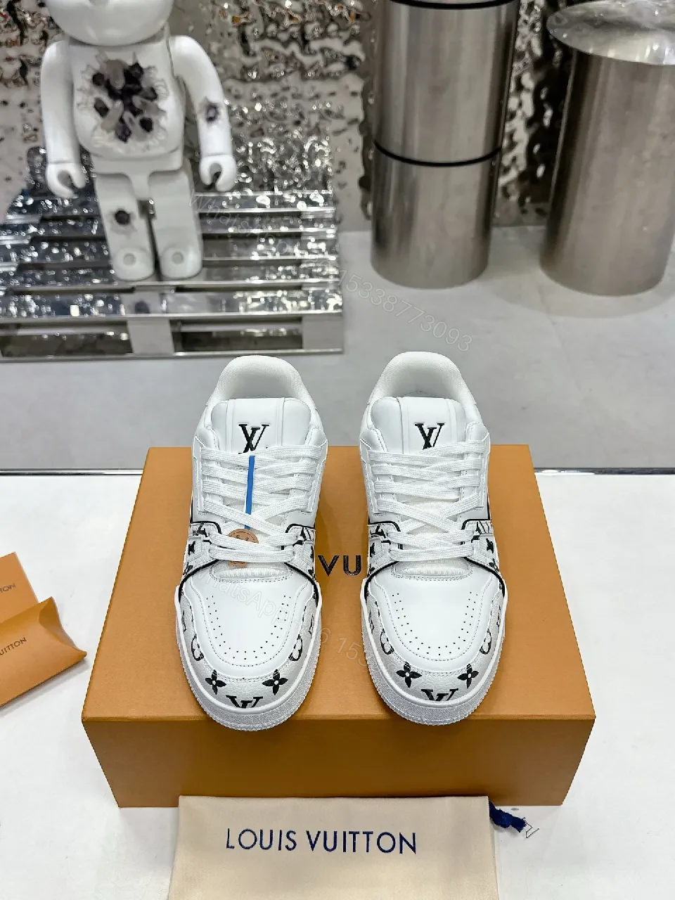 View 3 of White Leather Sneaker, Monogram Motif, Luxe Street Style, Designer Flair, Sneaker